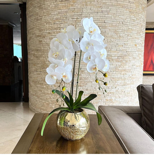 Orquídeas en base de vidrio tipo espejo craquelada dorada.